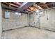 Unfinished basement with concrete floor and walls at 2314 E 58Th St, Indianapolis, IN 46220