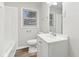Clean bathroom with white vanity and bathtub at 2314 E 58Th St, Indianapolis, IN 46220