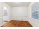 Charming dining room with hardwood floors and view of kitchen at 2314 E 58Th St, Indianapolis, IN 46220