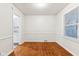 Bright dining room with hardwood floors and view of kitchen at 2314 E 58Th St, Indianapolis, IN 46220