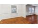 Bright dining area with hardwood floors and classic wainscoting at 2314 E 58Th St, Indianapolis, IN 46220