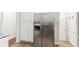 Modern kitchen features stainless steel appliances and white cabinets at 2314 E 58Th St, Indianapolis, IN 46220