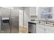 Modern kitchen with stainless steel appliances and white cabinets at 2314 E 58Th St, Indianapolis, IN 46220
