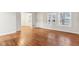 Bright living room featuring hardwood floors and large windows at 2314 E 58Th St, Indianapolis, IN 46220