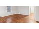 Spacious living area with hardwood floors and large windows at 2314 E 58Th St, Indianapolis, IN 46220