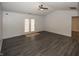 Spacious living room featuring hardwood floors and French doors at 2914 Rothe Ln, Indianapolis, IN 46229