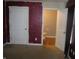 Small bathroom with toilet and wood floor at 317 N Bradley Ave, Indianapolis, IN 46201