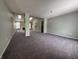 Bright dining room featuring a chandelier and large window at 5849 Jamestown Square Ln, Indianapolis, IN 46234