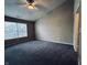 Large main bedroom with vaulted ceilings and carpet at 5849 Jamestown Square Ln, Indianapolis, IN 46234