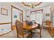 Elegant dining room with a large table and built-in hutch at 6151 W Richman Ln, New Palestine, IN 46163