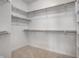 Large walk-in closet with ample shelving and hanging space at 6634 Royal Oakland Pl, Indianapolis, IN 46236