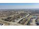 Expansive aerial view of a residential community featuring tree-lined streets, manicured lawns, and a serene atmosphere at 78 Chatham Brook Dr, Westfield, IN 46074