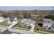Aerial view showcasing a lovely home in a peaceful neighborhood with lush greenery and well-manicured lawns at 78 Chatham Brook Dr, Westfield, IN 46074