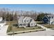 Aerial view showcasing the home's manicured lawn, long driveway, and proximity to neighboring houses at 78 Chatham Brook Dr, Westfield, IN 46074