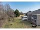 Large backyard with a playset and covered patio provides a perfect setting for Gathering fun and outdoor gatherings at 78 Chatham Brook Dr, Westfield, IN 46074