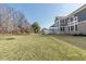 Well-manicured backyard features a swing set and playset, offering ample space for children to play and enjoy the outdoors at 78 Chatham Brook Dr, Westfield, IN 46074
