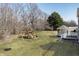 Private backyard with a playset and ample green space, providing a secure and enjoyable environment for activities at 78 Chatham Brook Dr, Westfield, IN 46074