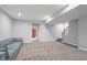 Finished basement with sitting area and access to bathroom and stairs at 78 Chatham Brook Dr, Westfield, IN 46074