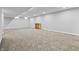 Unfinished basement featuring neutral carpet, white trim, and natural wood cabinet at 78 Chatham Brook Dr, Westfield, IN 46074