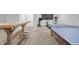 Finished basement with game table, exercise equipment, and seating area at 78 Chatham Brook Dr, Westfield, IN 46074