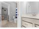 A bathroom featuring a bright vanity and tile floor with a view to the toilet and shower at 78 Chatham Brook Dr, Westfield, IN 46074