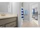 Clean bathroom with blue striped shower curtain at 78 Chatham Brook Dr, Westfield, IN 46074