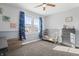 Bright bedroom with playful decor, beadboard walls and a large window for natural light at 78 Chatham Brook Dr, Westfield, IN 46074