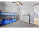 A bedroom featuring bunk beds, storage, and easy access to other rooms in the home with an ensuite bath at 78 Chatham Brook Dr, Westfield, IN 46074