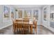 Sun-drenched breakfast nook with table and chairs, overlooking backyard at 78 Chatham Brook Dr, Westfield, IN 46074