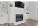 Modern fireplace with white stone and built-in shelving at 78 Chatham Brook Dr, Westfield, IN 46074