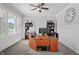 Spacious home office with built-in shelving and large windows at 78 Chatham Brook Dr, Westfield, IN 46074