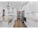 Spacious kitchen with granite countertops, white cabinets, and stainless steel appliances at 78 Chatham Brook Dr, Westfield, IN 46074
