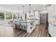 Island kitchen features granite countertops, stainless appliances, and a breakfast bar at 78 Chatham Brook Dr, Westfield, IN 46074