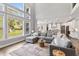 Open-concept living room showcases large windows and seamless flow into the kitchen at 78 Chatham Brook Dr, Westfield, IN 46074