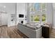Living room with tall windows, fireplace, and open layout for a bright and spacious feel at 78 Chatham Brook Dr, Westfield, IN 46074