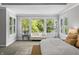 Sunlit main bedroom with large windows and a comfortable sitting area at 78 Chatham Brook Dr, Westfield, IN 46074
