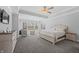 Spacious main bedroom with large windows, carpeted floor, and ample furniture at 78 Chatham Brook Dr, Westfield, IN 46074