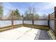 Backyard space with partial metal fence and concrete patio area at 7906 Hampton Pl, Fishers, IN 46038