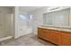 Primary bathroom with double vanity and granite at 7988 Kersey Dr, Indianapolis, IN 46236