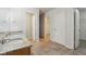 Double vanity bathroom with granite countertops at 7988 Kersey Dr, Indianapolis, IN 46236