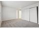 Well-lit bedroom featuring double closets at 7988 Kersey Dr, Indianapolis, IN 46236