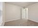 Spacious bedroom with neutral walls and carpet at 7988 Kersey Dr, Indianapolis, IN 46236