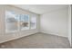 Bedroom with three windows and neutral decor at 7988 Kersey Dr, Indianapolis, IN 46236