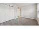 Bedroom with double doors and carpet at 7988 Kersey Dr, Indianapolis, IN 46236