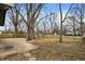 Spacious backyard with patio and tree-lined fence at 88 Sherman Dr, Carmel, IN 46032