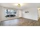 Living room featuring wood-look tile floors and updated finishes at 88 Sherman Dr, Carmel, IN 46032