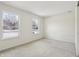 Bright bedroom with neutral carpeting and two large windows at 14278 Holly Berry Cir, Fishers, IN 46038