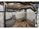 Unfinished basement with utilities and some storage at 1601 Spruce St, Indianapolis, IN 46203