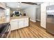 Modern kitchen with granite island and stainless steel appliances at 1601 Spruce St, Indianapolis, IN 46203