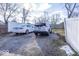 Gravel parking area with space for two cars at 1601 Spruce St, Indianapolis, IN 46203